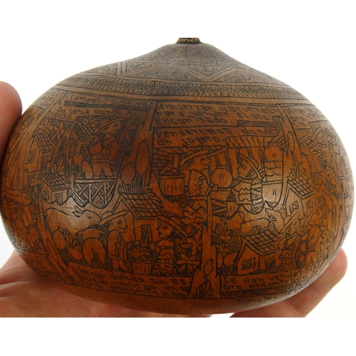 403 - Victorian penwork nut with scenes of storytelling, 10cm diameter