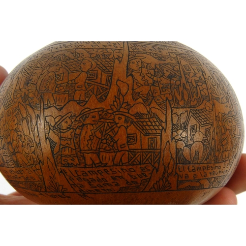 403 - Victorian penwork nut with scenes of storytelling, 10cm diameter