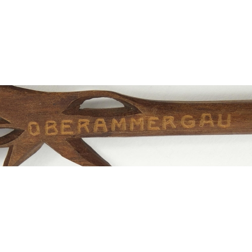 104 - Three carved wooden Black Forest dip pens - one with a bear, the largest 22cm long