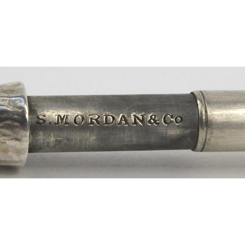 99 - S. Mordan & Co silver coloured metal and enamel champagne bottle propelling pencil, 5cm high