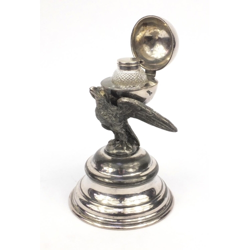 67 - Novelty silver plated desk inkwell of an eagle, 21cm high