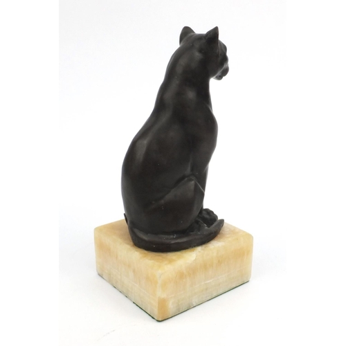 7 - French bronze cat, signed Césaro, raised on a marble base, 26cm high