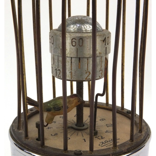 1310 - Kaiser Orbital birdcage clock with hanger, 21cm high