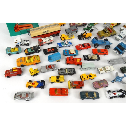 464 - Collection of die cast vehicles, mostly Matchbox examples, and a roulette wheel