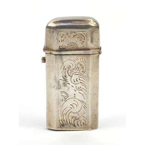 115 - Continental silver coloured metal vesta with engraved decoration, indistinct marks to the lid, 6cm h... 