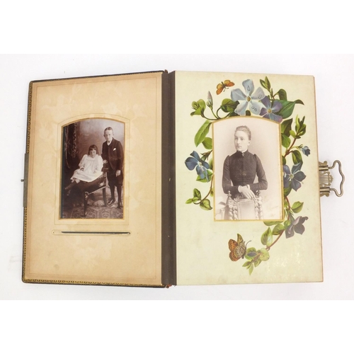 252 - Edwardian leather bound musical cabinet card album containing assorted family photographs, 30cm x 25... 