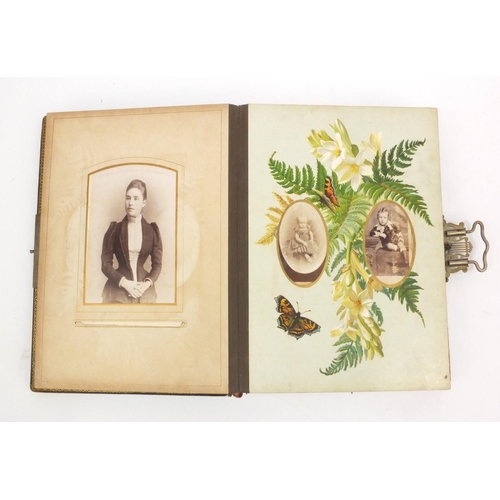 252 - Edwardian leather bound musical cabinet card album containing assorted family photographs, 30cm x 25... 