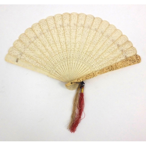 611 - Oriental Chinese ivory fan carved and pierced with figures, housed in a fitted wooden box, 21cm long