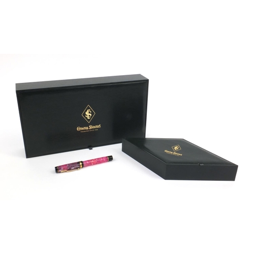 73a - Boxed Conway Stewart limited edition pink marbleised fountain pen 'Duro', the pen with gold band and... 