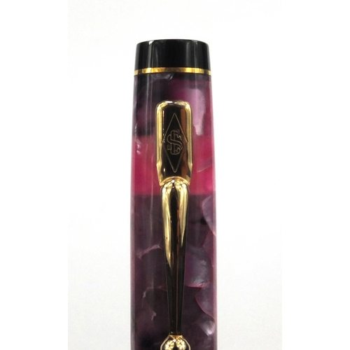 73a - Boxed Conway Stewart limited edition pink marbleised fountain pen 'Duro', the pen with gold band and... 