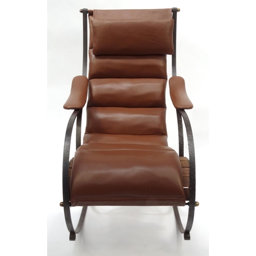 2032 - Robert Winfield design rocking chair with steel frame and brown leather upholstery, 99cm high