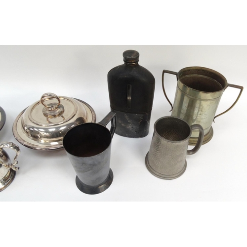 276 - Assorted metalwares including silver plated tureens, large hip flask, pewter tankards, etc