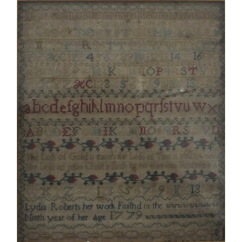 154A - 18th Century needlework sampler by Linda Roberts, 9th Year of Age 1779, mounted in an oak frame, 34c... 