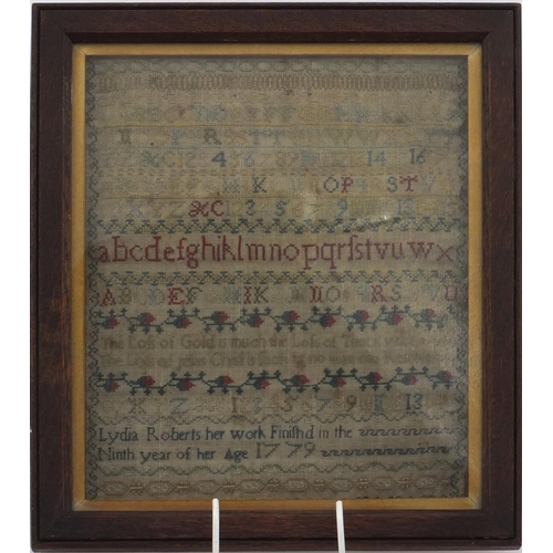 154A - 18th Century needlework sampler by Linda Roberts, 9th Year of Age 1779, mounted in an oak frame, 34c... 