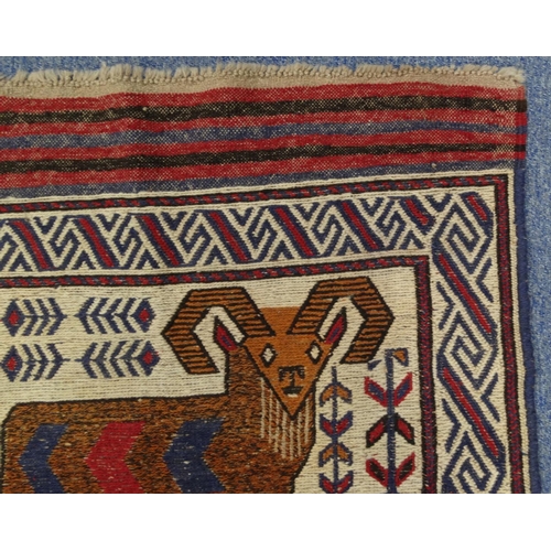 2031 - Rectangular Middle Eastern Qalin rug with geometric border, the central field decorated with two goa... 