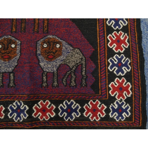 2045 - Rectangular Middle Eastern Qalin rug with geometric border, the central field decorated with lions a... 