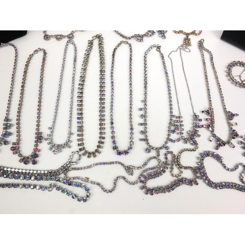 2690 - Large selection of white metal and multi-coloured glass necklaces