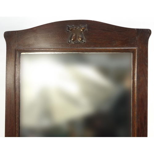 2036 - Arts and crafts oak hall mirror with brass plaque and cupboard base, 180cm high x 61cm wide x 43cm d... 