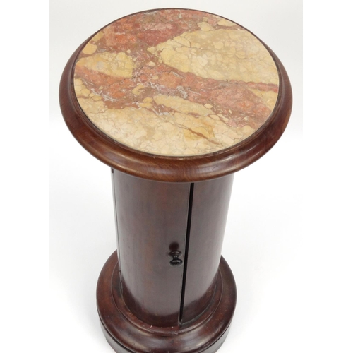 2029 - Victorian circular mahogany stand with inset marble top, the top 36cm diameter x 80cm high