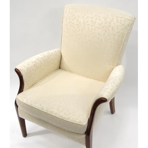 2030 - Parker Knoll armchair with cream leaf patterned upholstery