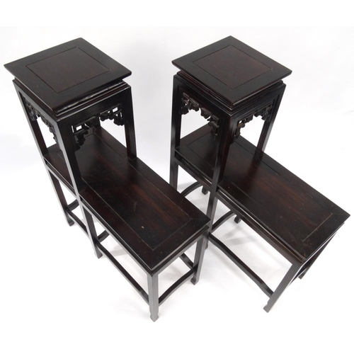 2054 - Pair of oriental Chinese hardwood two tier step stands, 96cm high x 72cm wide x 29cm deep