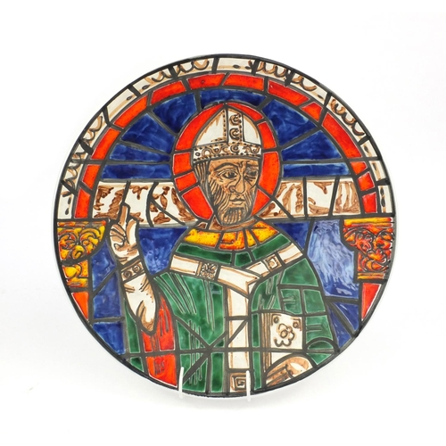 2229 - Large Poole Pottery charger decorated with Thomas Becket in the act of blessing, 41cm diameter