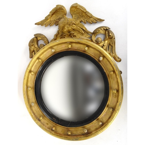 2012 - Regency gilt wood circular convex mirror with eagle crest