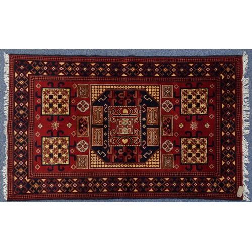 2014 - Rectangular Middle Eastern rug with geometric border, the central field with geometric floral decora... 