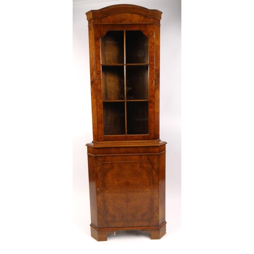 36 - Walnut corner cabinet with glazed door above cupboard door, 184cm high x 65cm wide x 46cm deep