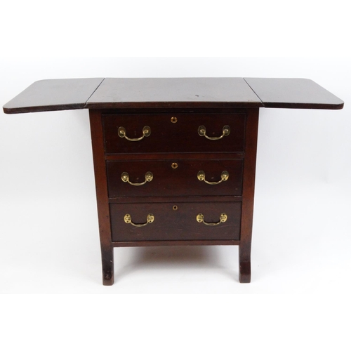 45 - Mahogany three drawer chest with dropleaf ends, 76cm high x 65cm wide when folded x 49cm deep