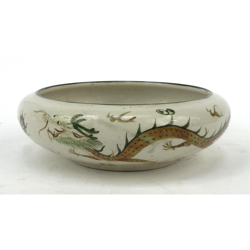 416 - Oriental Chinese stoneware bowl hand painted with a dragon chasing a pearl, 23cm diameter