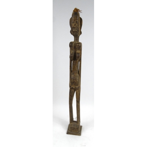 2040 - Large floorstanding African carved wooden figure, 155cm high