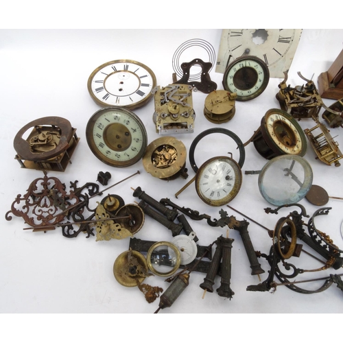 507 - Box of assorted clock movements and parts