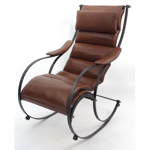 2032 - Robert Winfield design rocking chair with steel frame and brown leather upholstery, 99cm high