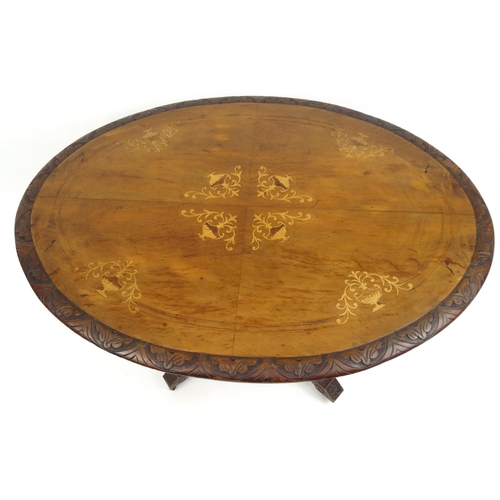 54A - Oval inlaid walnut loo table with quarter veneered top, the top 118cm x 84cm