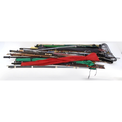 532 - Large selection of mostly sea-fishing rods, together with some landing nets