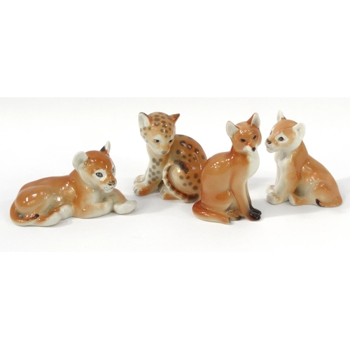 150 - Four Russian china USSR animals including leopard cub and fox