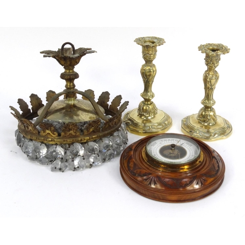 267 - Brass and glass bag chandelier, pair of brass candlesticks and a carved mahogany barometer