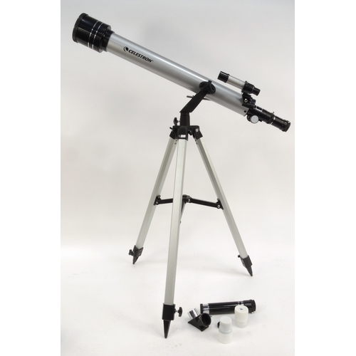 298 - Celestron telescope on stand with eyepieces