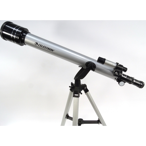 298 - Celestron telescope on stand with eyepieces