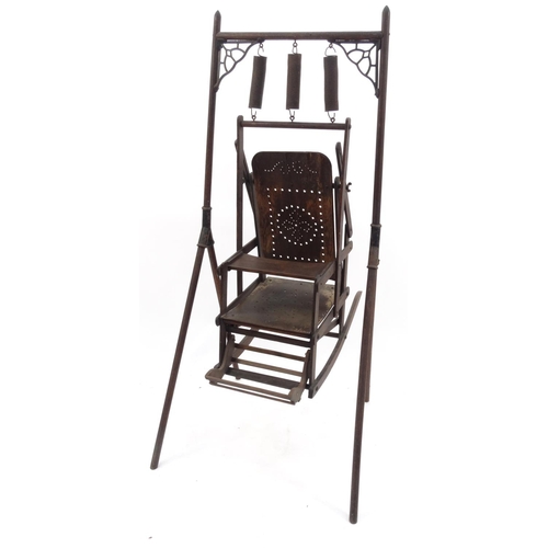 76 - Antique child's swinging chair