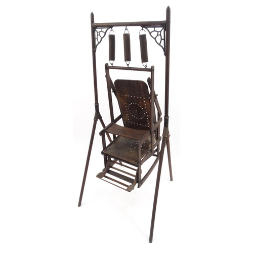 76 - Antique child's swinging chair