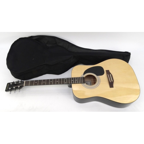 157 - Falcon wooden acoustic guitar with carry case, model number FG100N