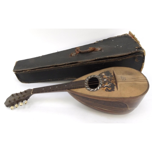 161 - Old wooden mandolin with Gartini Lugini label, inlaid with tortoiseshell mother of pearl