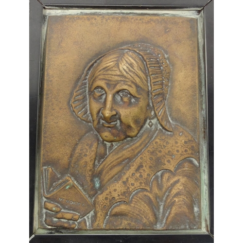631 - Pair of bronzed plaques of an elderly gentleman and lady, in black wooden frames, the plaques, 15cm ... 