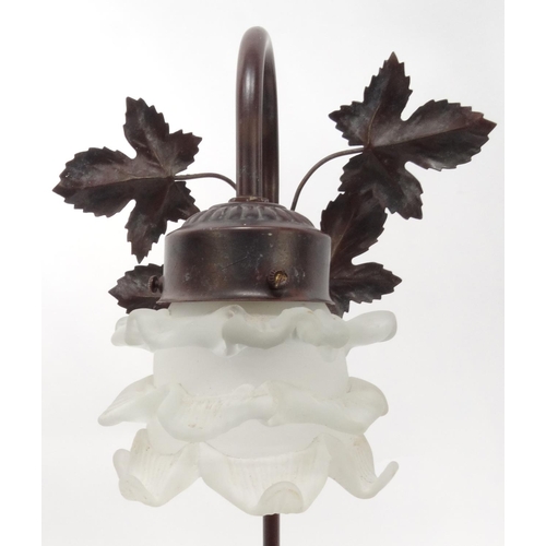 183 - Bronzed figural table lamp with frosted glass shade, 57cm high