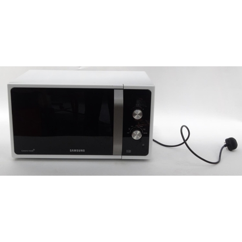 300 - Samsung microwave, 26cm high x 49cm wide x 32cm deep