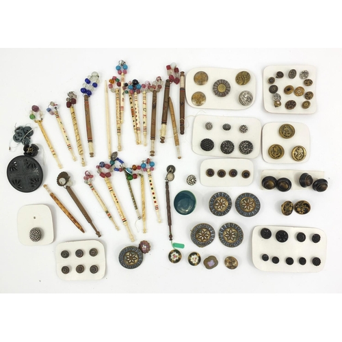 99 - Selection of Victorian bone lace bobbins, together with some antique buttons