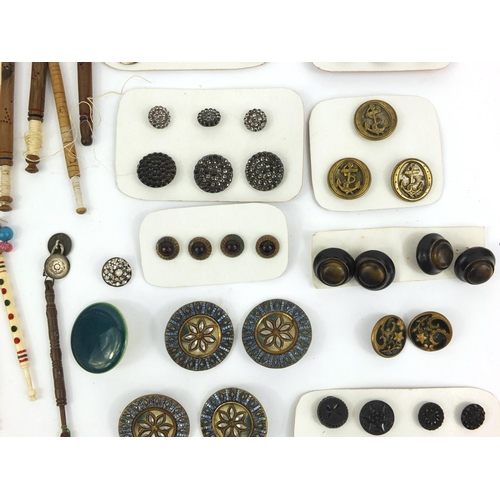 99 - Selection of Victorian bone lace bobbins, together with some antique buttons