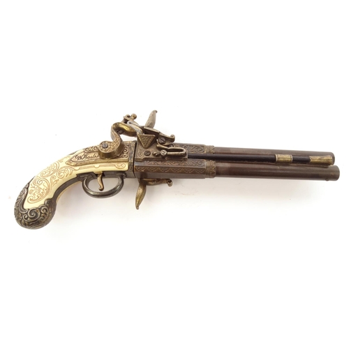 747 - Decorative flintlock pistol, 32cm long